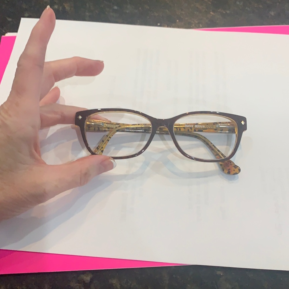Dark brown eyeglass frame with cheeta print
